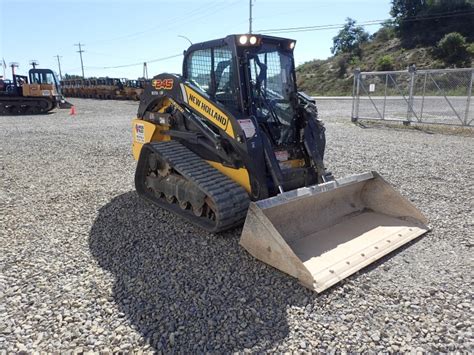 used new holland c245 skid steer